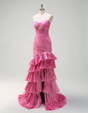 Robe de bal longue fuchsia à volants et décolleté en cœur avec fente