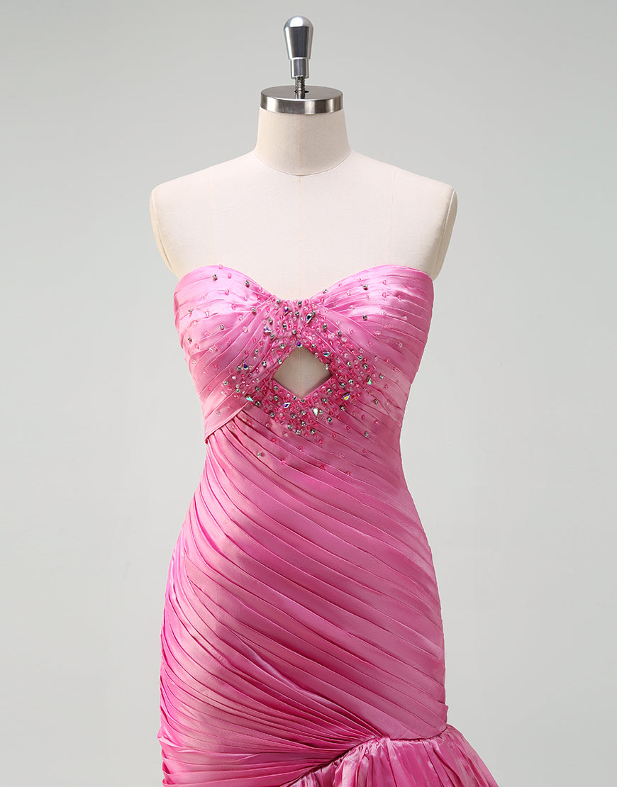 Robe de bal longue fuchsia à volants et décolleté en cœur avec fente