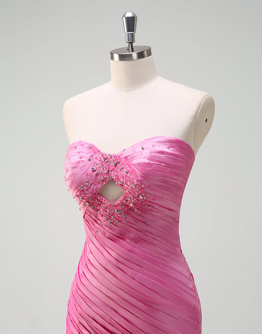 Robe de bal longue fuchsia à volants et décolleté en cœur avec fente